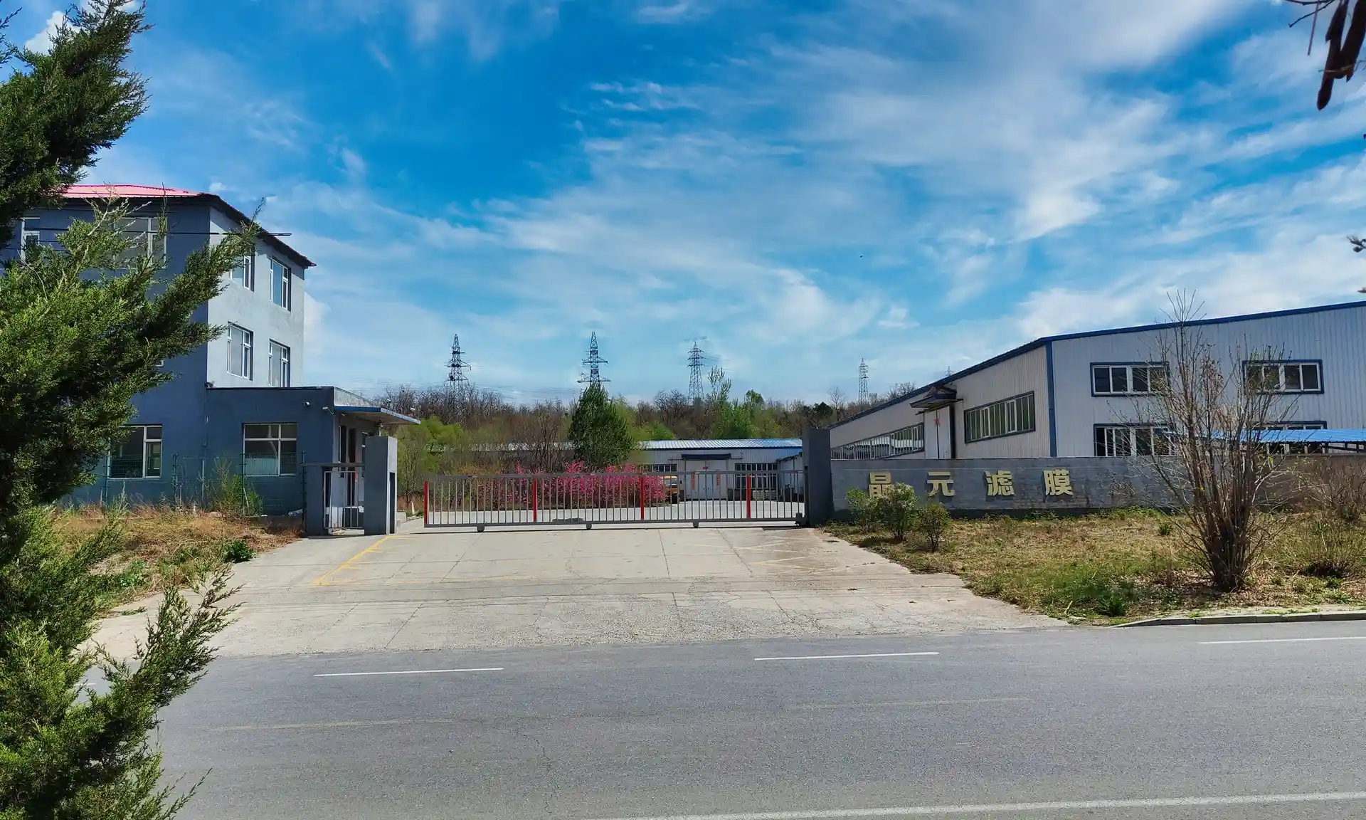 Jingyuan 14,000 m² manufacturing facility main gate and factory building exterior view