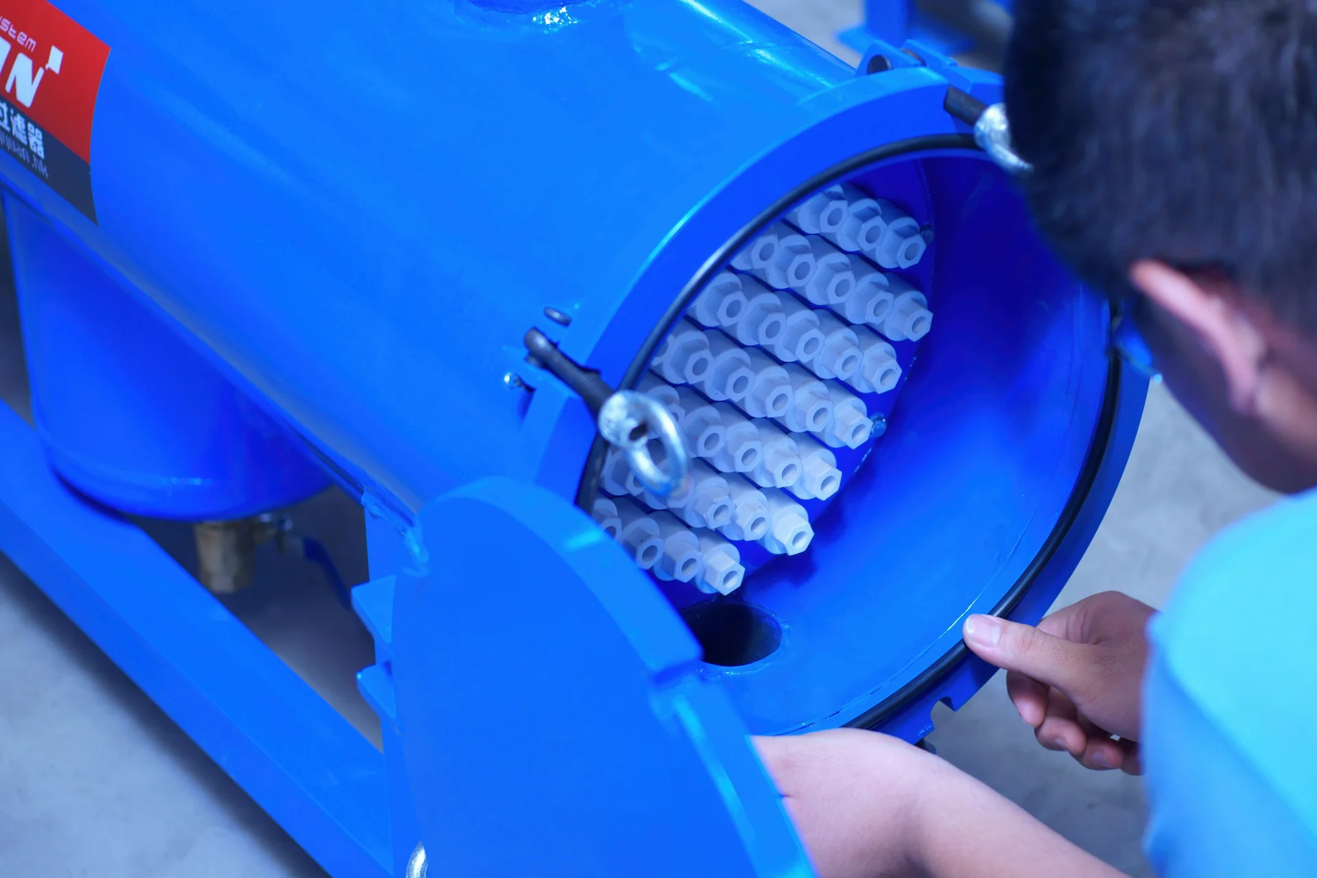 Jingyuan filter housing welding and assembly workshop with industrial filtration system fabrication in progress